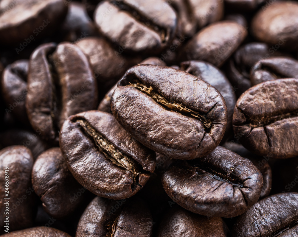 Roasted coffee beans. Food and drink background. Top view. Roasted coffee beans. Food and drink background. Top view.