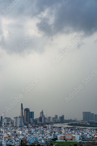 District 1 with Bitexco Financial Tower in Saigon with Cloudy Sky