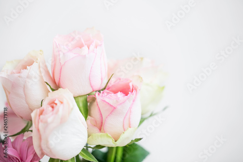 Pink soft roses bouquet with copy space