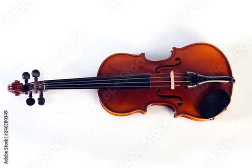 Violin front view isolated on white.Violin isolated on white background, a symbol of classical music. Close up of a violin on white background.