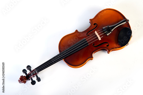 Violin front view isolated on white.Violin isolated on white background, a symbol of classical music. Close up of a violin on white background.