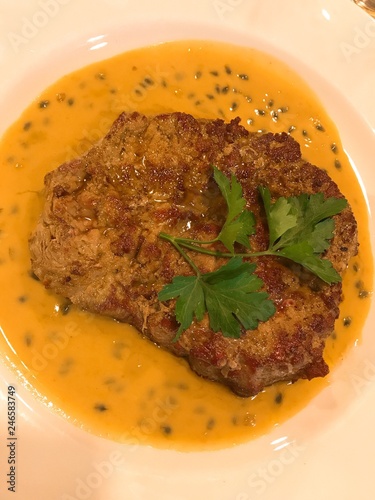 Sirloin steak with passion fruit sauce. Typical from Sao Miguel island in Azores from Associação Agrícola de São Miguel resturant