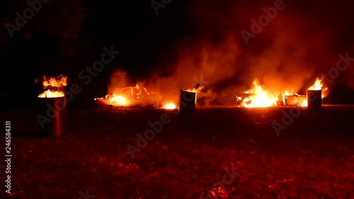 Burning cars in the street