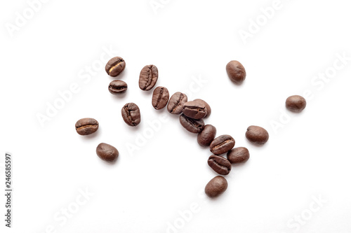 Coffee beans isolated on white background. Close-up.