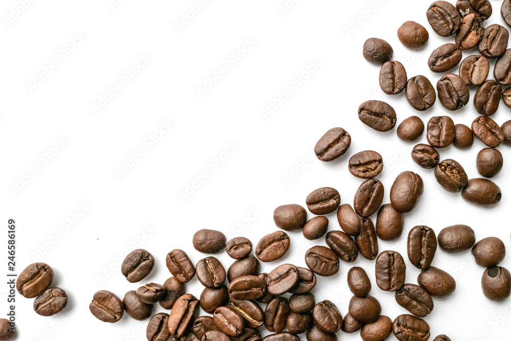 Roasted coffee beans isolated on white background. Close-up. Roasted coffee beans isolated on white background. Close-up.