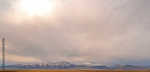 Lowe Peak and Utah Valley under a vast cloudy sky
