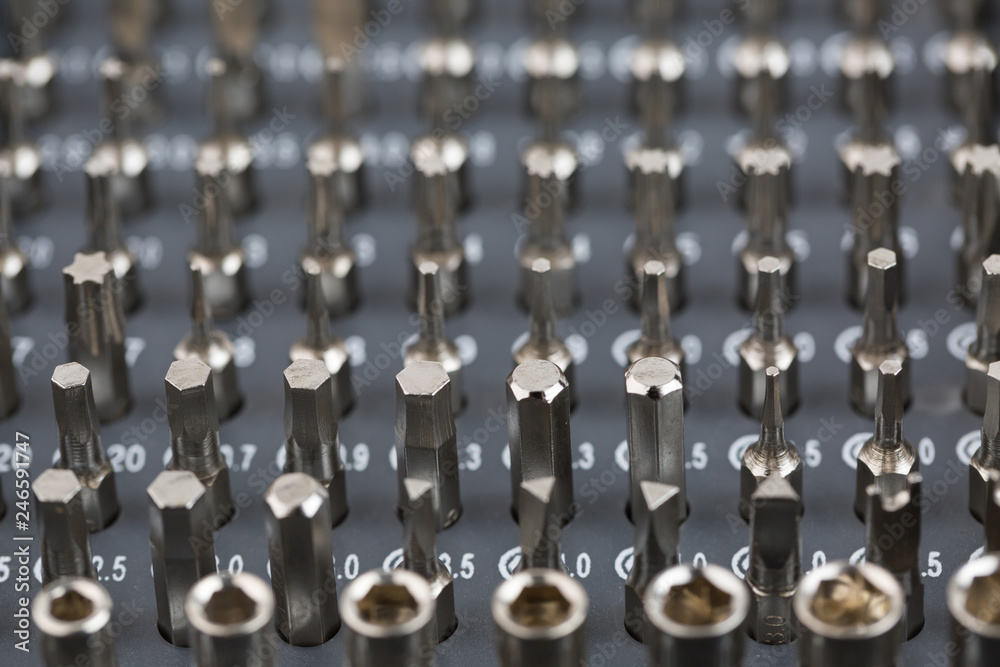Closeup of set of screwdriver heads of various types.