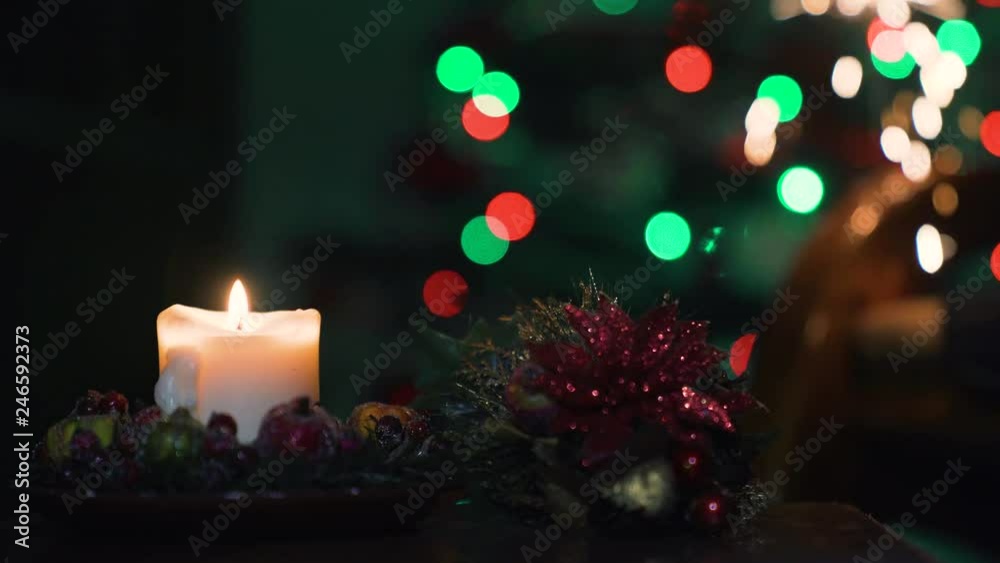 Christmas Candle and Sparks of Bengal Light on Christmas Tree. Diff. 4k Christmas Candle and Sparks of Bengal Light on Christmas Tree. Diff. 4k
