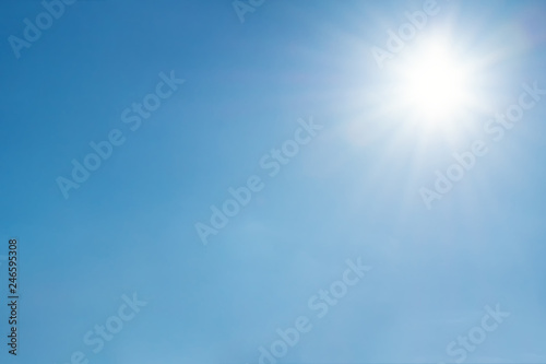 Clear sky with sun and sunrays. Daytime and good weather