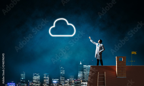 Conceptual image of doctor with cloud symbol