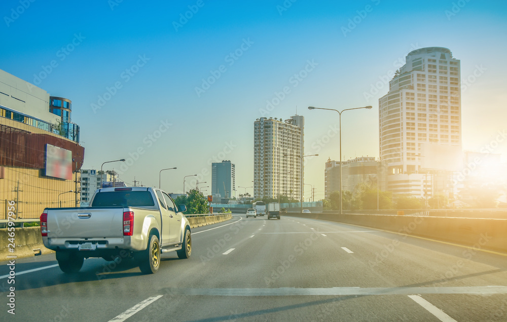 Car driving  on road and Small passenger car seat on the road used for daily trips