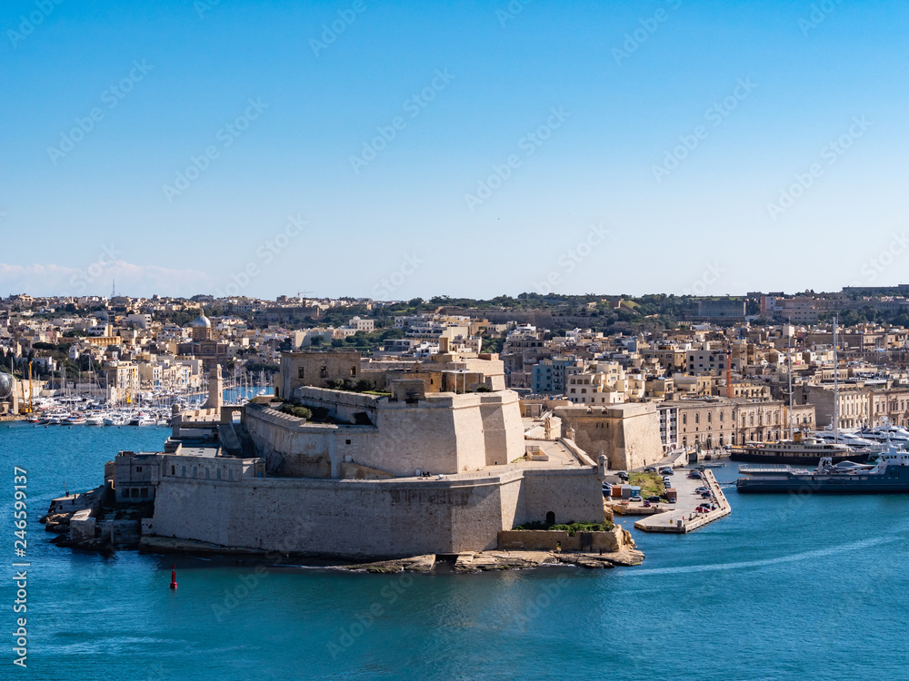 Fort St. Angelo is a bastioned fort in Birgu, Malta, located at the centre of the Grand Harbour. It was originally built in the medieval period as a castle called the Castrum Maris. Fort St. Angelo is a bastioned fort in Birgu, Malta, located at the centre of the Grand Harbour. It was originally built in the medieval period as a castle called the Castrum Maris.