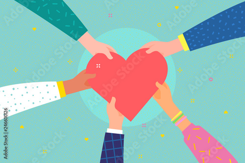 Charity concept. Several people hold the heart