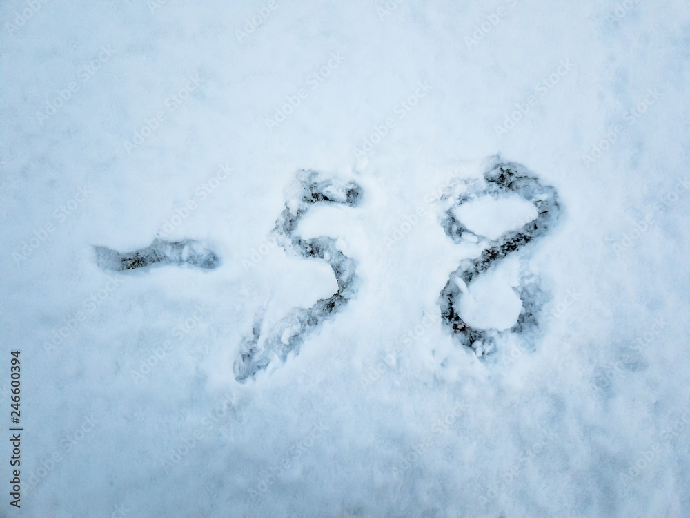 Temperature of -58 written in the freshly fallen snow Temperature of -58 written in the freshly fallen snow