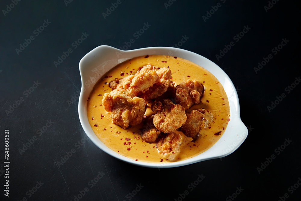 Fried chicken with cheese sauce
