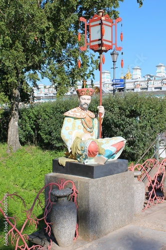 Chinese figure on the Big Chinese Bridge. Alexandrovsky Park. Pushkin City.  photo