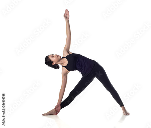 Sporty young woman doing yoga practice isolated on white background - concept of healthy life and natural balance between body and mental development ,with clipping path - Image