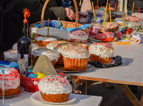 The consecration of eggs and cakes near the Church-chapel of the Intercession of the blessed virgin in Rybatsky in St. Petersburg. photo