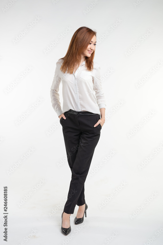 Portrait of fashionable beautiful asian woman in elegant clothes over white background Portrait of fashionable beautiful asian woman in elegant clothes over white background