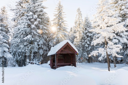 snow mountain landscape with summer house. © Djordje