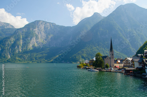 Classic postcard view of famous Hallstatt lakeside town in the Alps on a beautiful sunny day in summer, Salzkammergut region, Austria