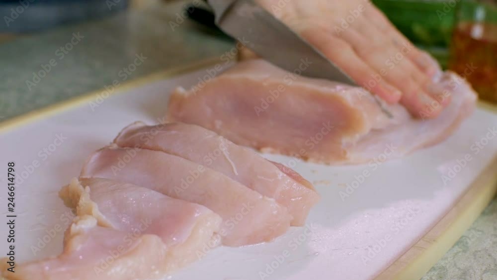 The girl is cutting turkey. Turkey steak. Close-up. HD The girl is cutting turkey. Turkey steak. Close-up. HD