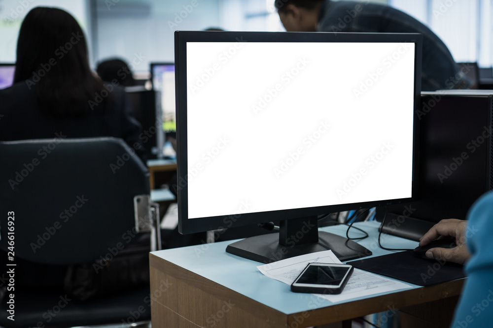 E-learning study concept: Mockup of monitor computer pc with groups teacher or business training computers using or typing on pc with blank white screen in information technology center at university E-learning study concept: Mockup of monitor computer pc with groups teacher or business training computers using or typing on pc with blank white screen in information technology center at university