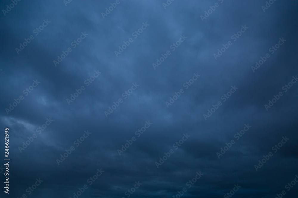 Dark stormy sky. Gloomy clouds. Overcast weather - obrazy, fototapety, plakaty 
