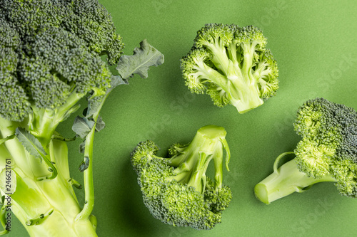 Minimalistic image of broccoli on bright background top view