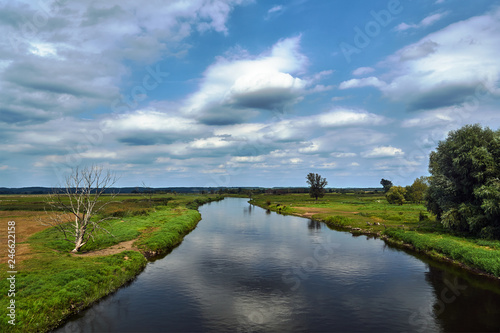 Notec River and rural landscape in summer in Poland..
