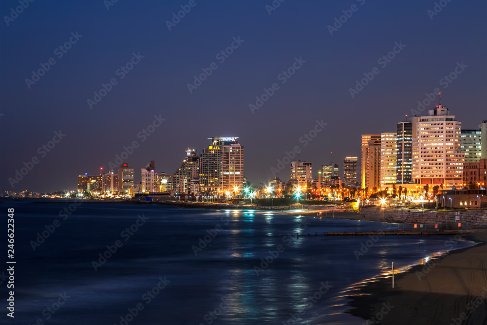 View of the night Tel Aviv and and coastal waters of the Mediterranean. Israel