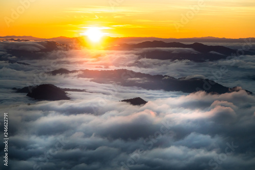 sunrise and sea of fog view on phu chi fa mountain area and national forest park in chiang rai, Thailand. © somesense