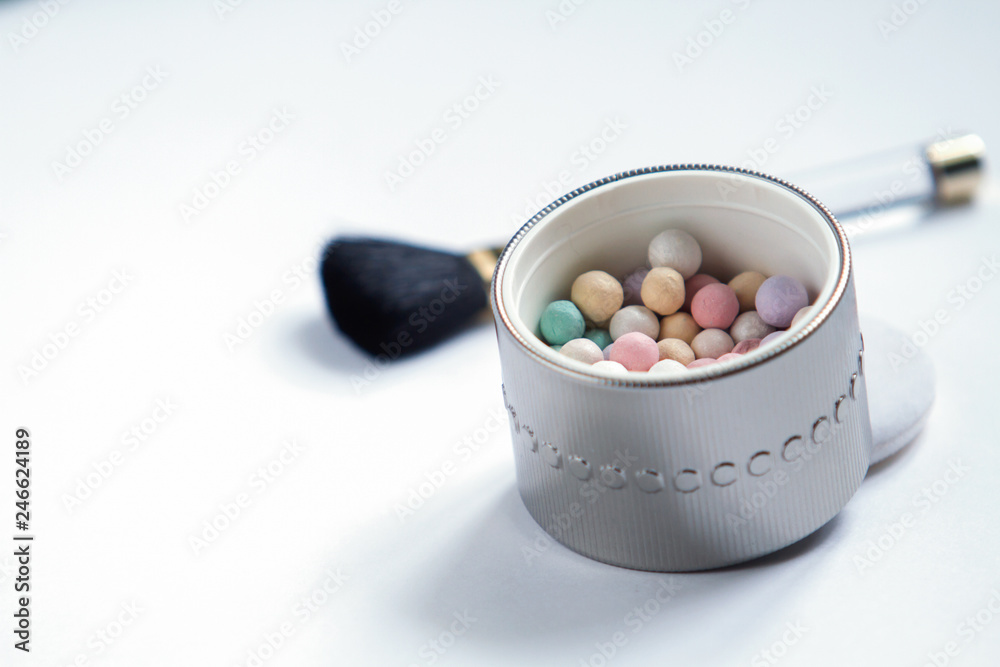 colored powder balls on white background colored powder balls on white background