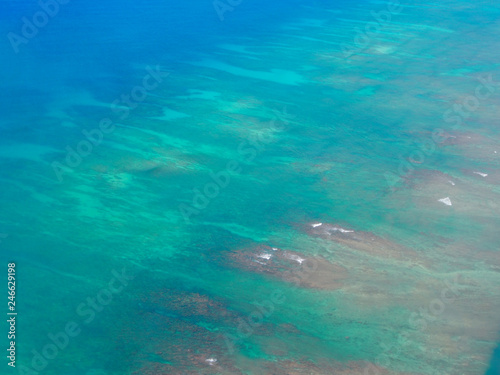 Waves lap on reef on coast Oahu