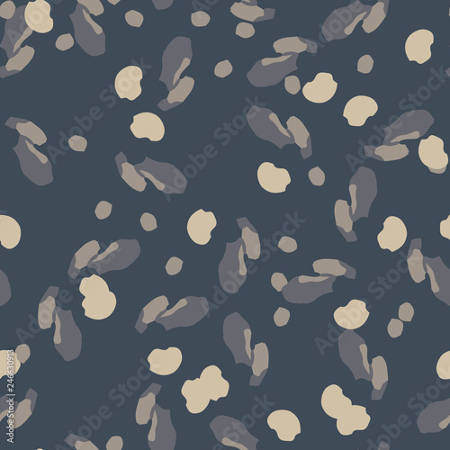 Urban camouflage of various shades of beige and blue colors