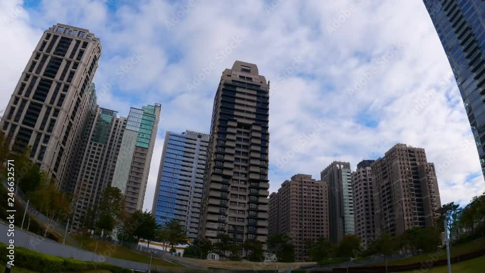 Time lapse cloud movement over modern building Time lapse cloud movement over modern building