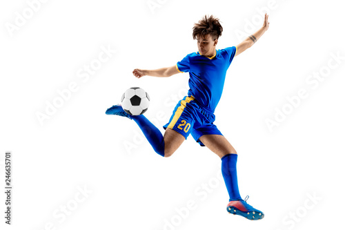 Young boy with soccer ball doing flying kick, isolated on white. football soccer players in motion on studio background. Fit jumping boy in action, jump, movement at game. © master1305