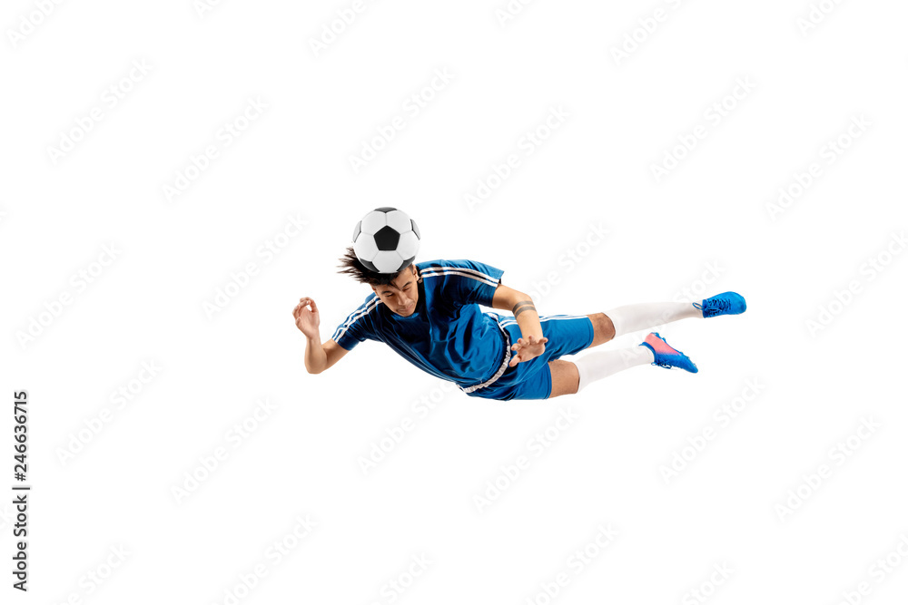 Young boy with soccer ball doing flying kick, isolated on white. football soccer players in motion on studio background. Fit jumping boy in action, jump, movement at game.