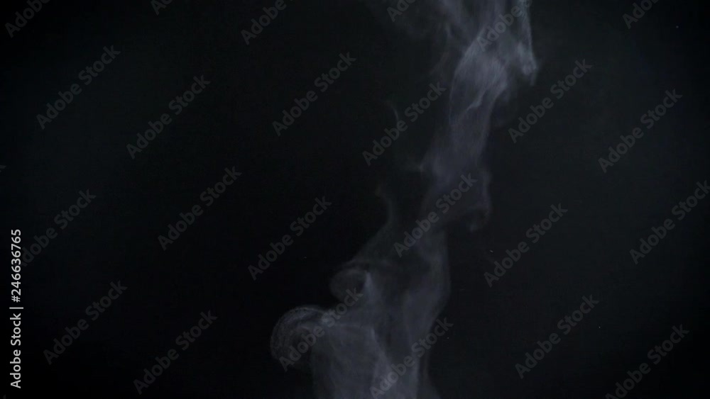 Closeup shot of vapouring smoke slowly flying on black background. Closeup shot of vapouring smoke slowly flying on black background.
