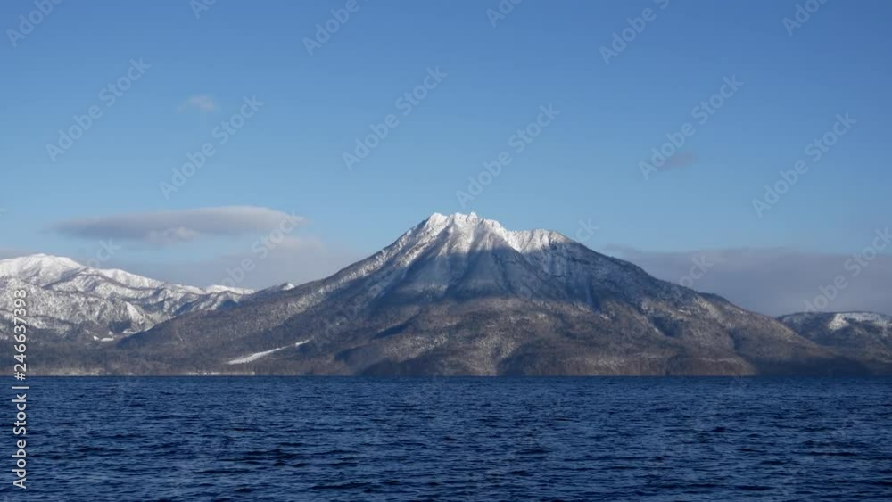 Panorama view on big japanese lake with volcanos in Hookaido Panorama view on big japanese lake with volcanos in Hookaido