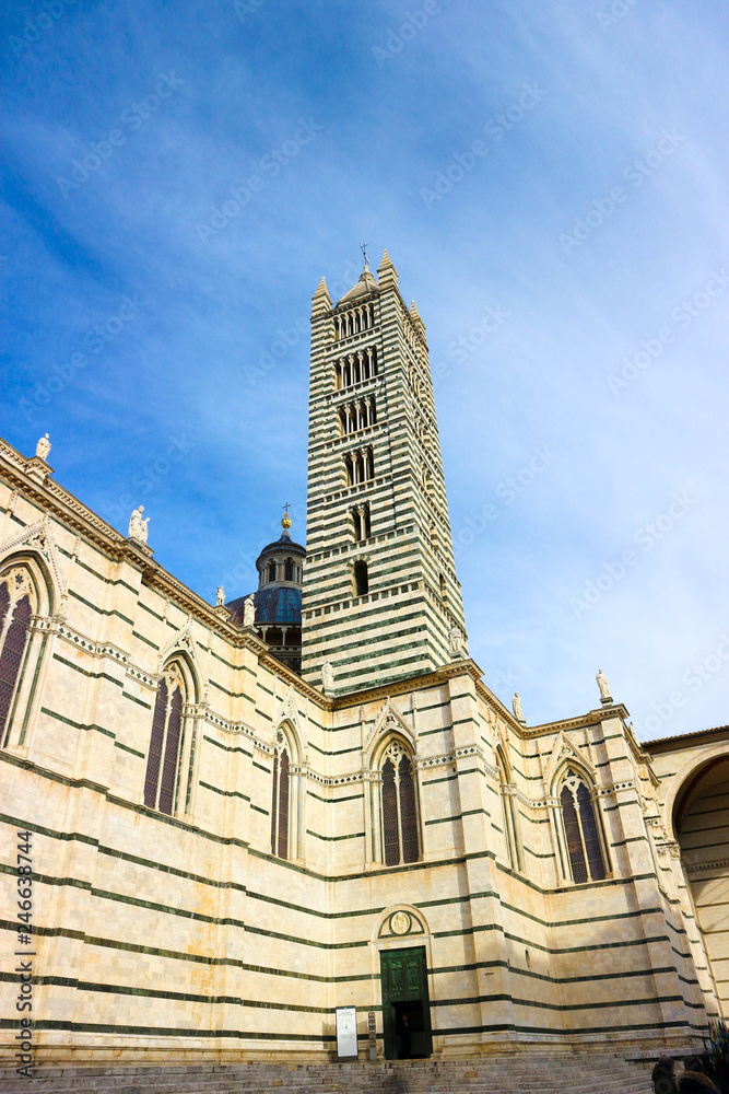 Metropolitan Cathedral of Saint Mary of the Assumption and bell tower in Siena, Tuscany, italy at the winter morning