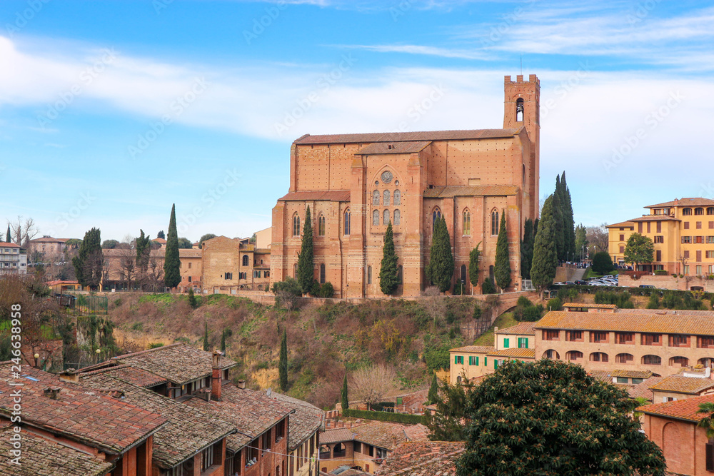 Basilica Cateriniana di San Domenico, medieval symbol of Siena, winter view with blue sky, Tuscany, Italy