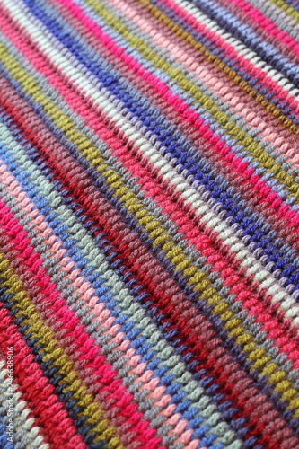 colorful textile background, striped crochet blanket 