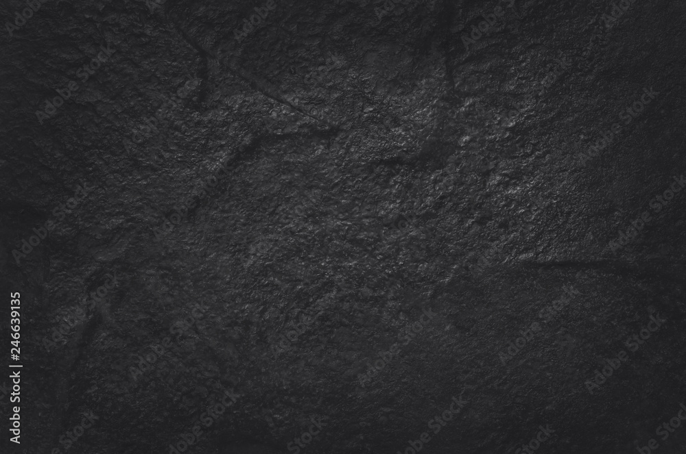 Fototapeta premium Dark grey black slate texture in natural pattern with high resolution for background and design art work. Black stone wall.