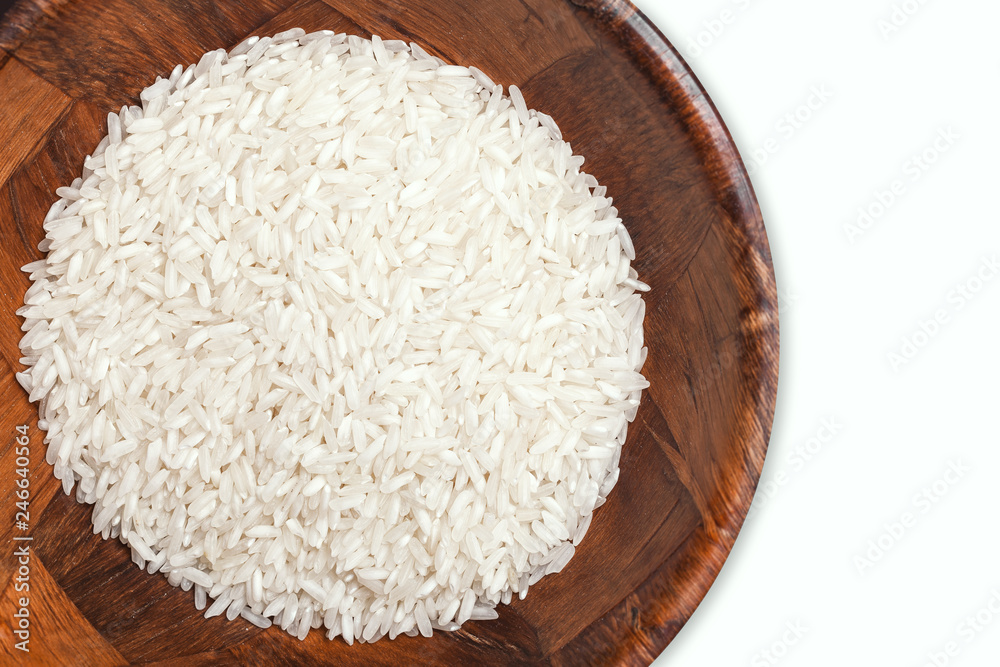 Wooden isolated bowl filled with white rice. Wooden isolated bowl filled with white rice.