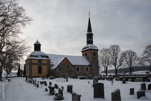 Winter  view over Lovo church on the Drottningholm island in Stockholm photo