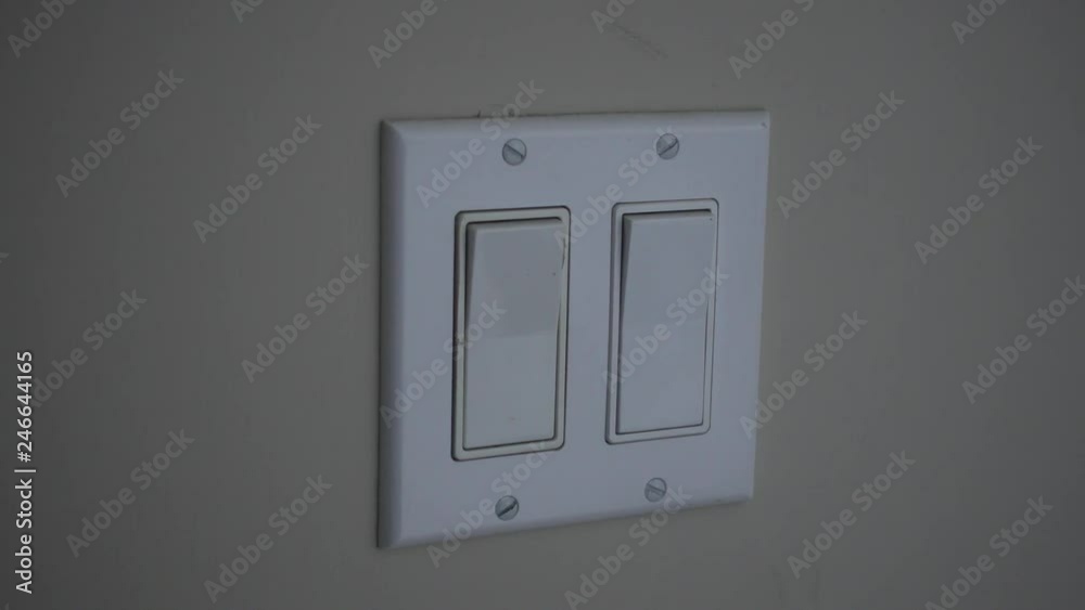 4K Mans Hand Turning Off Second Light Switch In Double Switch 4K Mans Hand Turning Off Second Light Switch In Double Switch