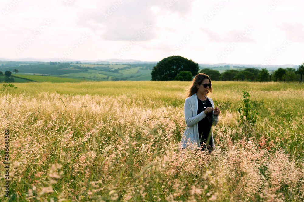 young woman enjoying the landscape. young woman enjoying the landscape.