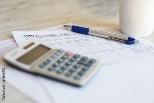 Tax Forms calculator pen paper finance business 