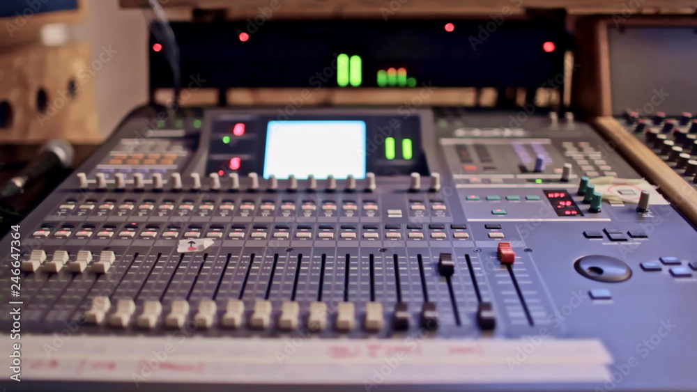 Sound mixing console processing audio levels Sound mixing console processing audio levels